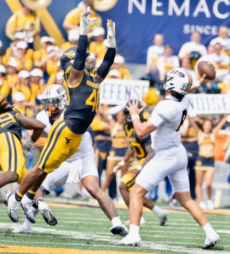 West Virginia rolls past U.T. Martin, 52-7